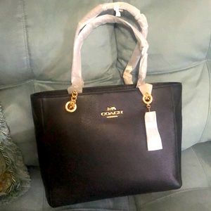 BRAND NEW Coach Marlie Tote purse in Black. Gold chain & black leather handles.
